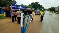 Portal penyekatan di perbatasan Riau untuk mengantisipasi mudik lebaran. (Liputan6.com/M Syukur)