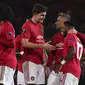 Gelandang Manchester United, Fred (kanan) berselebrasi dengan rekannya usai mencetak gol ke gawang Club Brugge  pada leg kedua 32 besar Liga Europa di Old Trafford, Inggris, Kamis, (27/2/2020). Fred mencetak dua gol dipertandingan ini dan mengantar MU menang telak 5-0. (AP Photo/Dave Thompson)