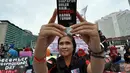 Mereka mendukung KPK untuk segera menuntaskan kasus korupsi di Indonesia, Jakarta, Minggu (7/12/2014). (Liputan6.com/Miftahul Hayat)