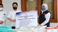 Penyerahan bantuan pemerintah untuk pemerinta provinsi Jawa Timur (Foto: Liputan6.com/Dian Kurniawan)