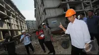 Jokowi melanjutkan relokasi warga bantaran kali ke rumah susun (Liputan6.com/Herman Zakharia)