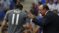 3. Pemecatan pelatih Real Madrid, Rafael Benitez, sepertinya membuat Gareth Bale kecewa, maklum saja sejak ditangani Rafa, mantan pemain Tottenham itu berhasil tampil memukau. (AFP/Lluis Gene)
