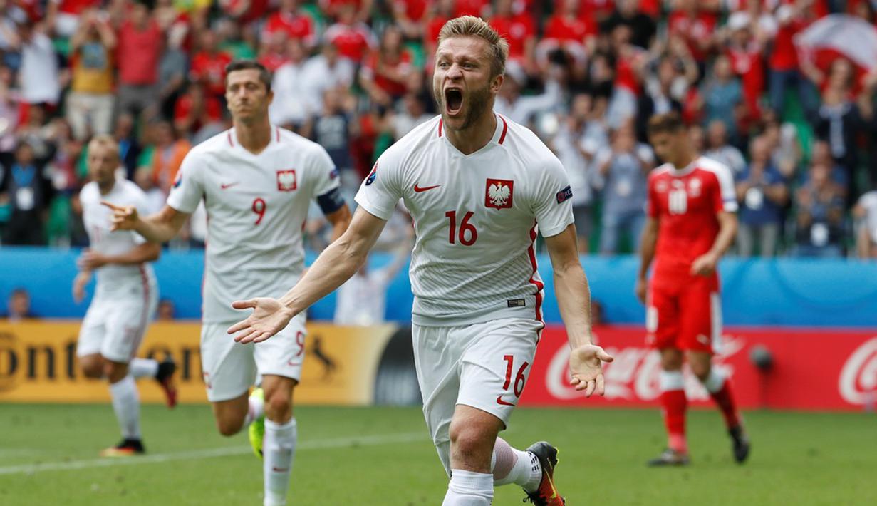 Ekspresi pemain Polandia, Jakub Blaszczykowski, setelah mencetak gol ke gawang Swiss pada babak 16 besar Piala Eropa 2016 di Stade Geoffroy-Guichard, Saint-Etienne, (25/6/2016). (Reuters/Yves Herman)