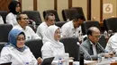 Menteri Ketenagakerjaan Ida Fauziyah saat mengikuti rapat kerja dengan Komisi IX DPR di Kompleks Parlemen Senayan, Jakarta, Selasa (6/6/2023). (Liputan6.com/Faizal Fanani)