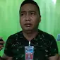 Anggota koramil menangkap TNI gadungan yang sudah meresahkan warga. Tak tanggung-tanggung, TNI gadungan itu juga mengaku wartawan salah satu media online di Gorontalo. (Liputan6.com/ Arfandi Ibrahim)