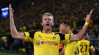 Andre Schurrle bergabung dengan Borussia Dortmund setelah ditransfer dari Wolfsburg senilai 25 juta pound. Namun, Schurrle baru tampil 180 menit dalam 2 partai. (AFP/Patrik Stollarz).