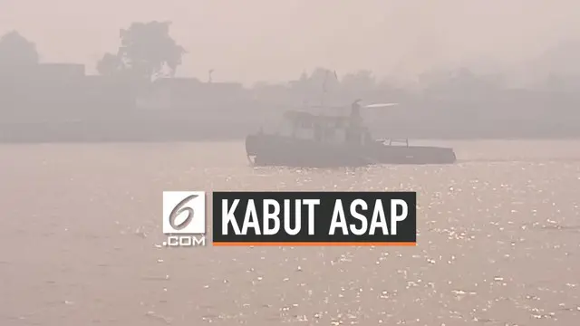 Kabut asap dari kebakaran hutan dan lahan, mulai berdampak bagi aktivitas warga Pontianak, Kalimantan Barat pada Jumat (6/9/2019) pagi.