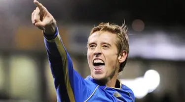 Portsmouth&#039;s English forward Peter Crouch celebrates after scoring during the English Premier league football match against West Bromwich Albion at The Hawthorns, on December 7, 2008. AFP PHOTO/ANDREW YATES