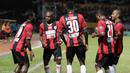 Para pemain Persipura merayakan gol yang dicetak James Koko Lomell ke gawang Persija pada laga Torabika Soccer Championship 2016 di Stadion Mandala, Jayapura, Jumat (29/4/2016). (Bola.com/Nicklas Hanoatubun)