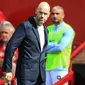 Ekspresi pelatih Manchester United, Erik ten Hag usai pertandingan melawan Brighton & Hove Albion pada pekan pembuka Liga Inggris 2022/2023 di stadion Old Trafford di Manchester, Inggris, Minggu (7/8/2022). Pertandingan Ini menjadi kekalahan pada debut pertama Erik ten Hag bersama Manchester United. (AFP/Lindsey Parnaby)