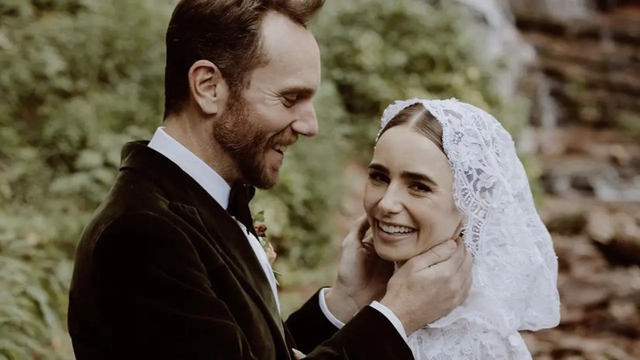 Lily Collins kenakan gaun didominasi warna putih berenda di hari Pernikahannya/dok. Instagram @Lilyjcollins