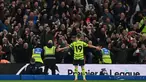 Lendro Trossard ikut menyumbang satu gol dalam kemenangan 3-0 Arsenal di markas Brighton pada laga lanjutan Liga Inggris, Sabtu (07/04/2024) malam WIB. (AFP/Glyn Kirk)