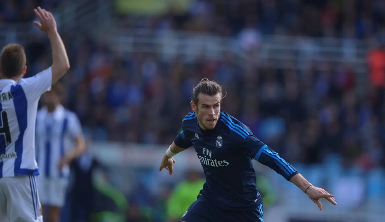 Ekspresi striker Real Madrid, Gareth Bale, setelah mencetak gol ke gawang Real Sociedad dalam laga La Liga Spanyol di Stadion Anoeta, Sabtu (30/4/2016) malam WIB. (Reuters/Vincent West)