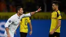 Real Madrid harus puas bermain imbang 2-2 melawan Borussia Dortmund dalam laga kedua Grup F Liga Champions di Signal Iduna Park, Rabu (28/9/2016) dini hari WIB. Cristiano Ronaldo menyumbang satu gol. (AFP/Patrik Stollarz)