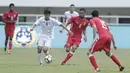 Pemain Uzbekistan, Nurulloev Sukhrob, saat melawan Bahrain pada laga PSSI Anniversary Cup 2018 di Stadion Pakansari, Senin (30/4/2018). Babak pertama  Uzbekistan 1-1 dengan Bahrain.  (Bola.com/M Iqbal Ichsan)