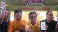 Kementerian Koperasi dan UKM merangkul generasi milenial dengan mendorong penggunaan tabungan online berbasis aplikasi dari KSP Sahabat Mitra Sejati (Liputan6.com/ Switzy Sabandar)