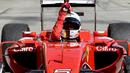 Ekspresi Sebastian Vettel setelah memenangi balapan. (AFP PHOTO/Andrej Isakovic)
