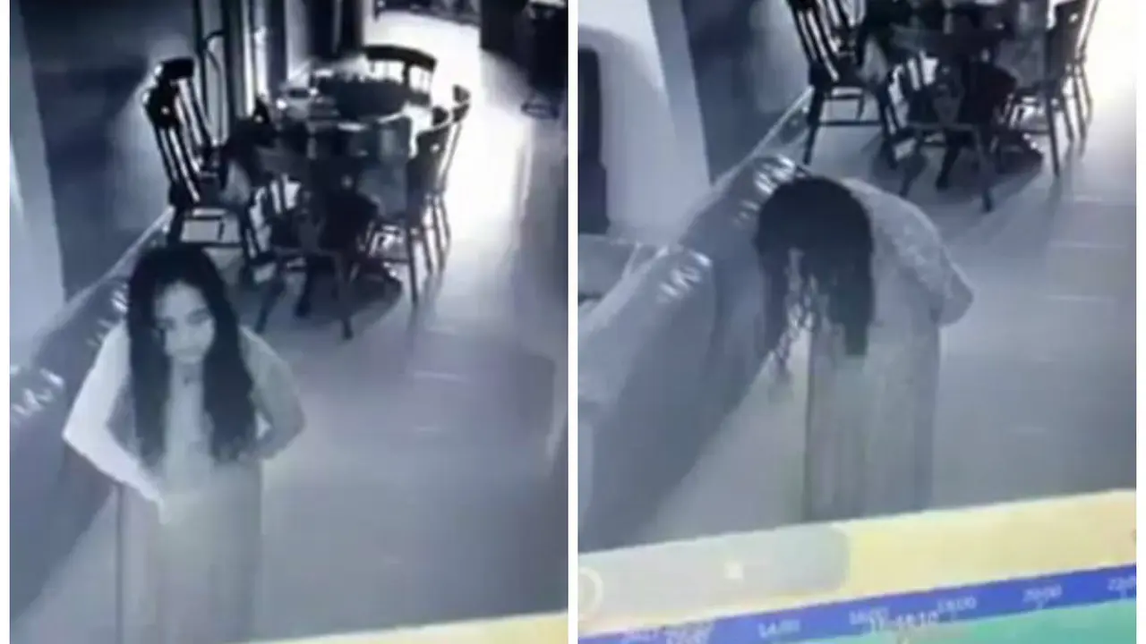 Perilaku aneh seorang asisten rumah tangga di Malaysia tertangkap kamera. Mirip Sadako