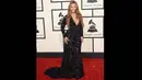 Beyonce Knowles tampak seksi dengan gaun hitamnya saat menghadiri ajang Grammy Awards ke-57 di Staples Center, Los Angeles, AS, Minggu (8/2/2015). (Jason Merritt/Getty Images/AFP)