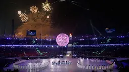 Kembang api saat menghiasi upacara pembukaan Olimpiade Musim Semi XII Paralimpiade di Stadion Olimpiade Pyeongchang, di Pyeongchang, Korea Selatan, (9/3). (Simon Bruty/OIS/IOC via AP)