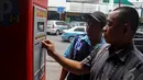 Sebelum ada parkir meter, pendapatan rata-rata retribusi parkir hanya Rp 500 ribu per hari, Jakarta, Senin (6/10/2014) (Liputan6.com/Faizal Fanani)