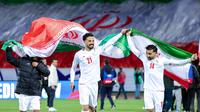 Iran menyusul Jepang untuk tampil di pesta akbar sepakbola tersebut. Iran mendapatkan tiket lolos itu setelah berimbang 2-2 kontra Uzbekistan di Azadi Stadium, Selasa (25/3/2025) malam WIB. Iran memang cuma butuh satu poin untuk lolos. (AFP)