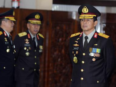 Kabareskrim Irjen Ari Dono Sukmanto, sebelum menerima tanda kehormatan Bintang Bhayangkara Pratama dalam upacara di Rupatama Mabes Polri, Jakarta, Selasa (21/6). 13 perwira bintang dua Polri dianugerahi tanda kehormatan itu. (Liputan6.com/Helmi Afandi)