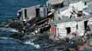 Gambar 5 Oktober 2018, pandangan umum pulau Migingo di perairan Danau Victoria, perbatasan Uganda dan Kenya. Pulau Migingo yang dikenal sebagai pulau terkecil di Afrika ini memiliki populasi yang sangat tinggi. (Yasuyoshi CHIBA/AFP)