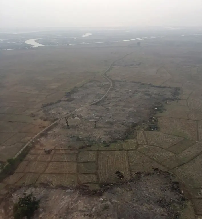 Foto diambil pada 8 Februari 2018 memperlihatkan sebuah desa Rohingya hancur dan rata (HANDOUT / AFP)