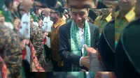 Jokowi resmi membuka Muktamar ke XIX sekaligus peringatan Hari Lahir (Harlah) Mathla'ul Anwar. (Liputan6.com/Yandhi Deslatama)