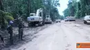 Citizen6, Kongo: Prajurit TNI yang tergabung dalam Satgas Kompi Zeni TNI Konga XX-I/MONUSCO menerapkan " posting system " dalam perbaikan jalan Dungu – Duru hingga Bitima sepanjang 103 Km. (Pengirim: Badarudin Bakri)