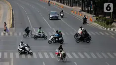 Kondisi lalu lintas di Jalan MH Thamrin, Jakarta, Rabu (2/10/2019). Jalan MH Thamrin yang biasanya ramai beberapa hari terakhir terpantau lengang. (Liputan6.com/Faizal Fanani)