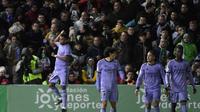 Penyerang Real Madrid, Rodrygo (kiri), merayakan gol ke gawang CP Cacereno pada 32 besar Copa del Rey 2022/2023 di Stadion Principe Felipe, Rabu (4/1/2023) dini hari WIB. (AFP/CRISTINA Quicler)