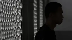 Siluet petinju Indonesia, Daud Yordan, usai menjalani latihan di Pertina, Jakarta, Rabu (3/2/2016). (Bola.com/Vitalis Yogi Trisna)