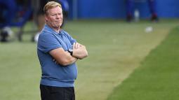 Pada laga tersebut anak asuh Ronald Koeman  menang meyakinkan dengan skor 3-1. (Foto: AFP/Pau Barrena)