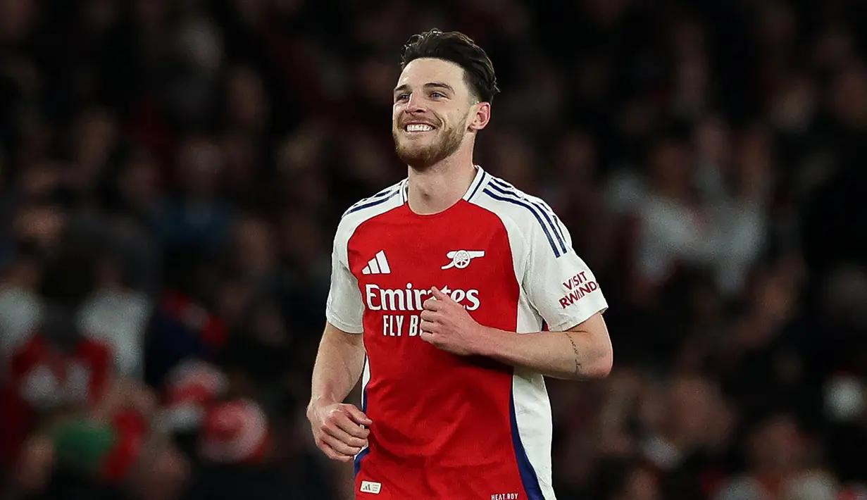 Di babak kedua, pada menit ke-58, Arsenal membuka keunggulan melalui tendangan bebas dari sisi kanan. Tendangan melengkung Declan Rice sempurna menaklukkan penjaga gawang Real Madrid, Thibaut Courtois. (Adrian Dennis/AFP)
