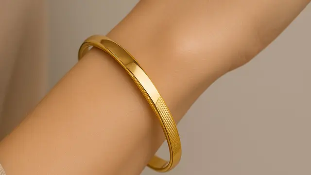 Model Gelang Emas 24 Karat Desain Simpel yang Lagi Ngetren 2025/AI