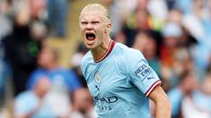 Manchester City sangat beruntung mendapat servis pemain sekelas Erling Haaland. Bomber yang ditebus seharga 75 juta Euro dari Dortmund itu tak henti-henti merobek gawang lawan. Sejauh ini ia telah mencetak 21 gol untuk City liga Inggris. (AFP/Nigel Roddis)