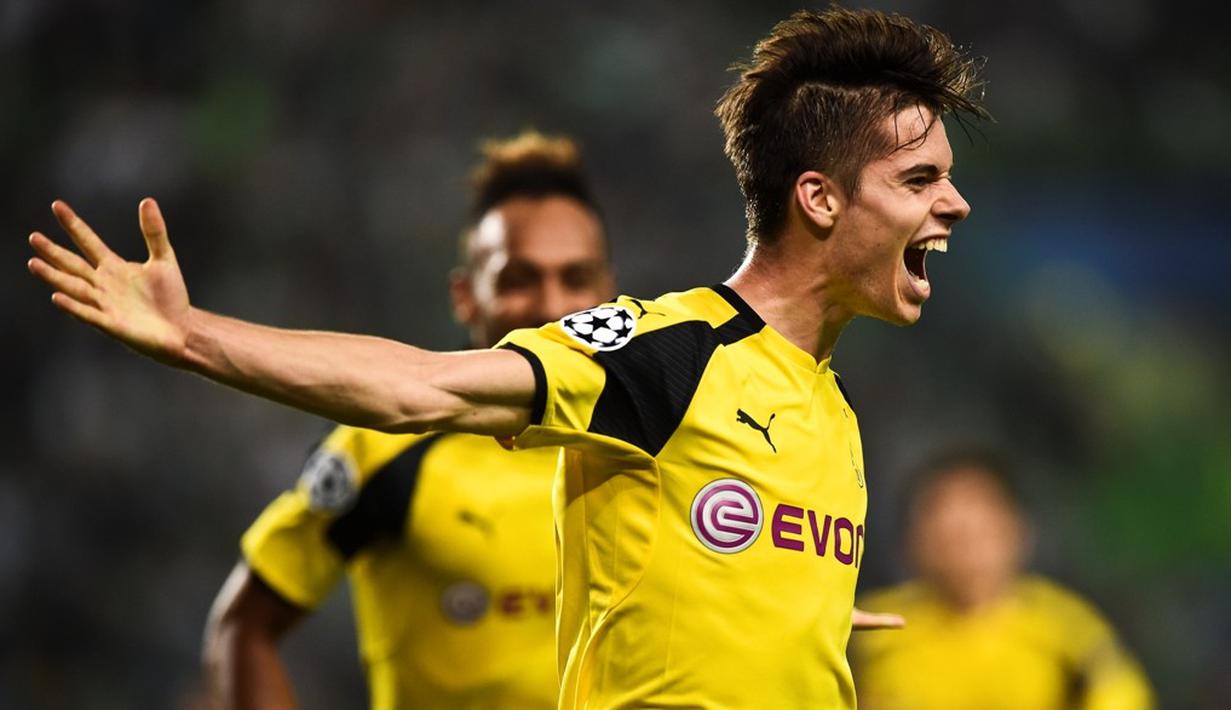 Ekspresi Julian Weigl setelah mencetak gol kedua Borussia Dortmund ke gawang Sporting CP dalam laga Grup F Liga Champions di Stadion Jose Alvalade, Lisbon, Rabu (19/10/2016) dini hari WIB. (AFP/Patricia De Melo Moreira)