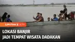 Lokasi banjir di Grobogan, Jawa Tengah, berubah menjadi tempat wisata dadakan. Naik ojek perahu hingga berenang, menjadi aktivitas warga saat mengunjungi hamparan sawah yang terendam banjir.