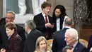CEO Meta dan Facebook Mark Zuckerberg dan Priscilla Chan menghadiri jamuan makan siang untuk menghormati Presiden Amerika Serikat yang baru saja dilantik, Donald Trump, di Statuary Hall, US Capitol, Washington DC, pada 20 Januari 2025. (Brendan SMIALOWSKI/AFP)
