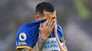 Reaksi kecewa pemain Brighton, Lewis Dunk saat timnya kalah dari Everton pada laga pekan ke-35 Liga Inggris 2022/2023 di  American Express Community Stadium, Brighton, Inggris, Selasa (09/05/2023) WIB. The Seagulls tunduk dengan skor 1-5. (AFP/Glyn Kirk)
