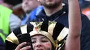 Seorang suporter Mesir saat akan menonton laga Grup A Piala Dunia melawan Uruguay di Stadion Ekaterinburg, Yekaterinburg, Jumat (15/6/2018). Terakhir kali Mesir lolos ke Piala Dunia tahun 1990. (AFP/Anne-Christine Poujoulat)