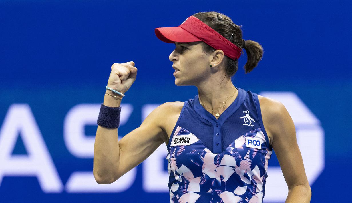 Laga pun akhirnya dimenangkan oleh Tomljanovic usai mengunci keunggulan di set ketiga dengan skor 6-1. (AFP/Corey Sipkin)