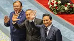 Deputi Gubernur Bank Indonesia (BI) terpilih, Thomas Djiwandono (kanan) berpose dengan Wakil Ketua Dewan Perwakilan Rakyat (DPR), Saan Mustopa (tengah) dan Cucun Ahmad Syamsurijal setelah Rapat Paripurna DPR RI Ke-12 Masa Persidangan III Tahun Sidang 2025–2026 di Kompleks Parlemen Republik Indonesia, Jakarta pada Selasa 27 Januari 2026. Rapat Paripurna Dewan Perwakilan Rakyat (DPR) Republik Indonesia menyetujui Thomas Djiwandono sebagai Deputi Gubernur Bank Indonesia (BI) periode 2026–2031. (Foto oleh AFP)