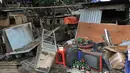 Empat puluh tiga  bangunan di Jalan Raya Pasar Jumat habis dibongkar oleh satpol PP (Liputan6.com/Johan Tallo)