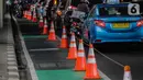 Kendaraan melintas di samping jalur khusus sepeda di Jalan Fatmawati Raya, Jakarta Selatan, Rabu (30/10/2019). Penundaan pembangunan jalur sepeda pada 2020 lantaran Komisi B ingin mengetahui rencana induk pembangunan jalur sepeda secara keseluruhan. (Liputan6.com/Faizal Fanani)