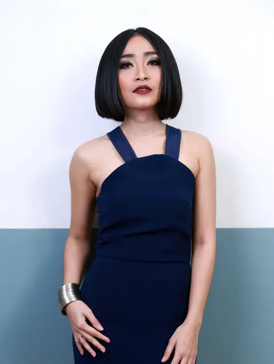 Penampilannya yang kian dewasa dan seksi ini dianggap mampu mendobrak pasar industri musik Indonesia. (Fathan Rangkuti/Bintang.com)