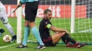 Pemain AC Milan, Leonardo Bonucci duduk di lapangan setelah gagal menghentikan tendangan pemain Austria Wien, Christoph Monschein pada matchday kelima Liga Europa di Stadion San Siro, Jumat (24/11). Milan menang telak 5-1. (Daniel Dal Zennaro/ANSA via AP)