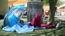 Dengan pertumbuhan penduduknya yang termasuk yang tertinggi di Amerika Serikat, ditambah dengan kurangnya perumahan yang terjangkau, Arizona telah mengalami peningkatan jumlah tunawisma sebesar 23 persen dalam beberapa tahun terakhir. (Patrick T. Fallon / AFP)